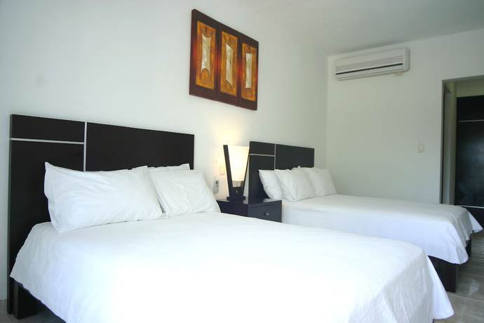Imagen de la habitación del Hotel Holly. Foto 13