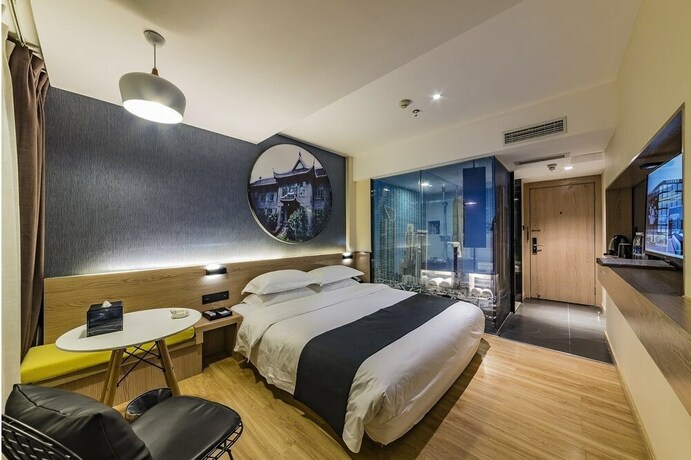 Imagen de la habitación del Hotel Hollyston Of Chengdu. Foto 15