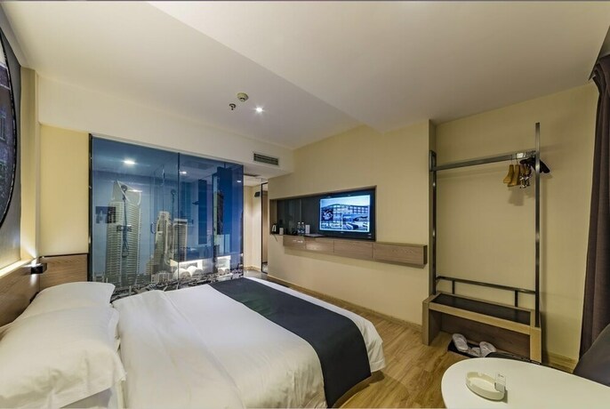Imagen de la habitación del Hotel Hollyston Of Chengdu. Foto 16