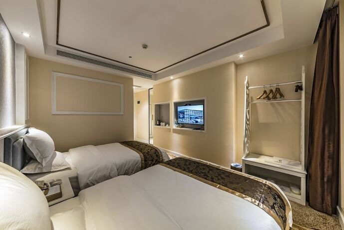 Imagen de la habitación del Hotel Hollyston Of Chengdu. Foto 18