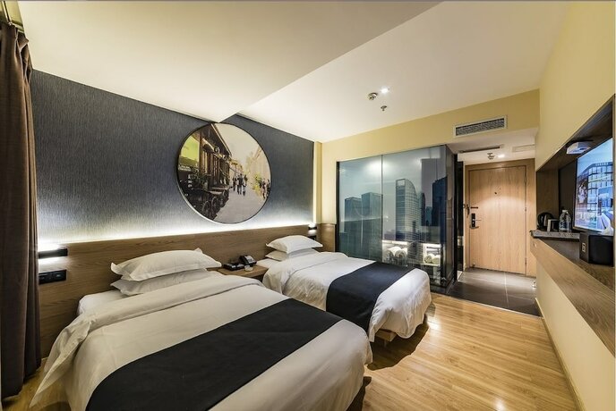 Imagen de la habitación del Hotel Hollyston Of Chengdu. Foto 22