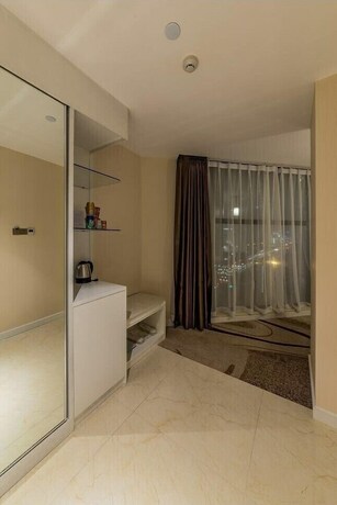 Imagen de la habitación del Hotel Hollyston Of Chengdu. Foto 23