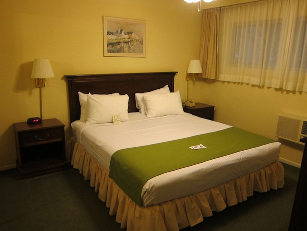Imagen de la habitación del Hotel Hollywood Orchid Suites. Foto 2