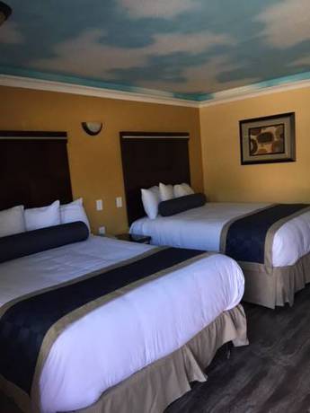 Imagen de la habitación del Hotel Hollywood Palms Inn and Suites. Foto 6