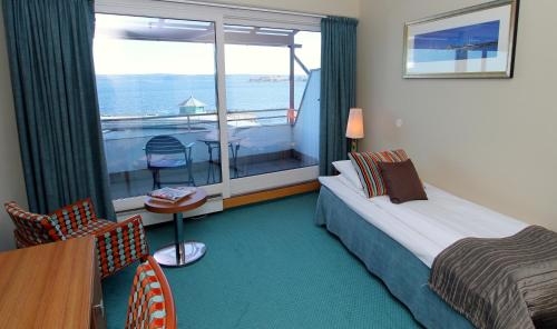 Imagen de la habitación del Hotel Holmen Fjordhotell. Foto 9