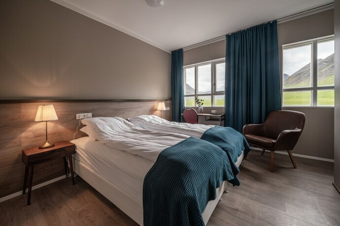 Imagen de la habitación del Hotel Holt Inn. Foto 19