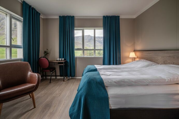 Imagen de la habitación del Hotel Holt Inn. Foto 23