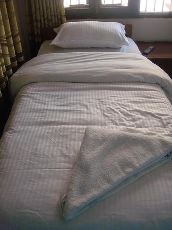 Imagen de la habitación del Hotel Holyland Guest House. Foto 10