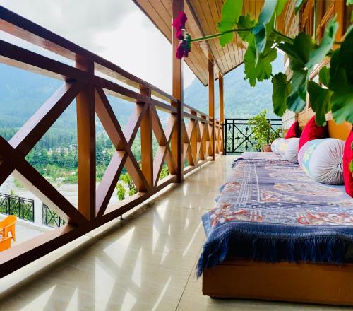 Imagen general del Hotel Holywood Riverview Resort, Manali - Scenic River & Mountain View. Foto 9