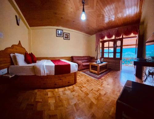 Imagen de la habitación del Hotel Holywood Riverview Resort, Manali - Scenic River & Mountain View. Foto 19