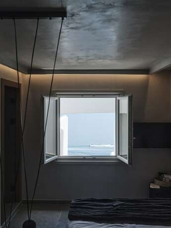 Imagen de la habitación del Hotel Hom Santorini. Foto 19