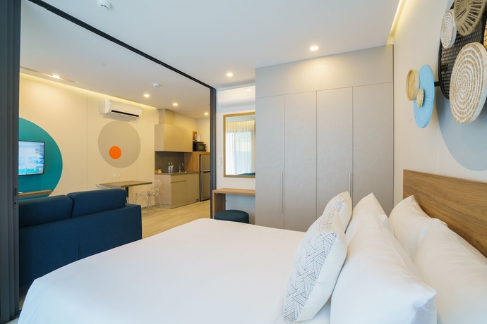 Imagen de la habitación del Hotel Homa Phuket Town. Foto 2