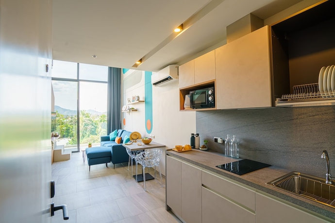 Imagen de la habitación del Hotel Homa Phuket Town. Foto 5