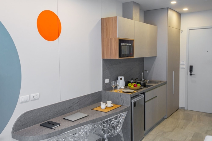 Imagen de la habitación del Hotel Homa Phuket Town. Foto 7