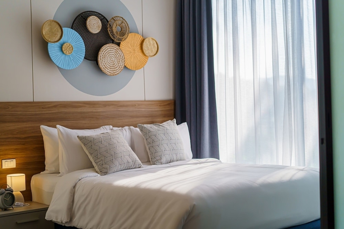 Imagen de la habitación del Hotel Homa Phuket Town. Foto 9