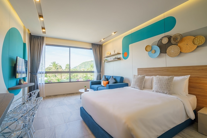 Imagen de la habitación del Hotel Homa Phuket Town. Foto 10