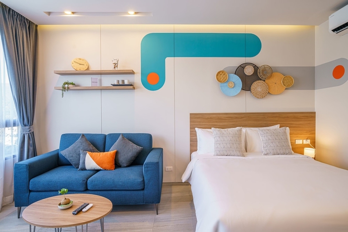 Imagen de la habitación del Hotel Homa Phuket Town. Foto 11