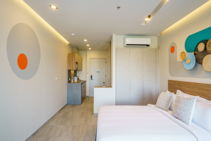 Imagen de la habitación del Hotel Homa Phuket Town. Foto 15