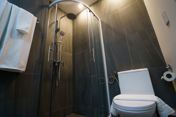 Imagen de la habitación del Hotel Homa Phuket Town. Foto 16