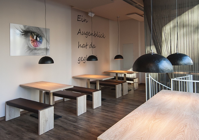 Imagen del bar/restaurante del Hotel Homaris The Corner. Foto 2