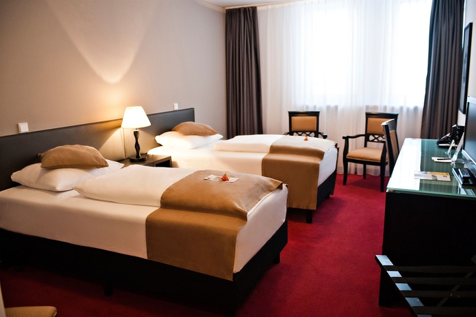 Imagen de la habitación del Hotel Homaris The Corner. Foto 4