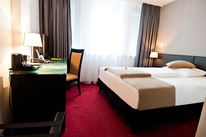 Imagen de la habitación del Hotel Homaris The Corner. Foto 10