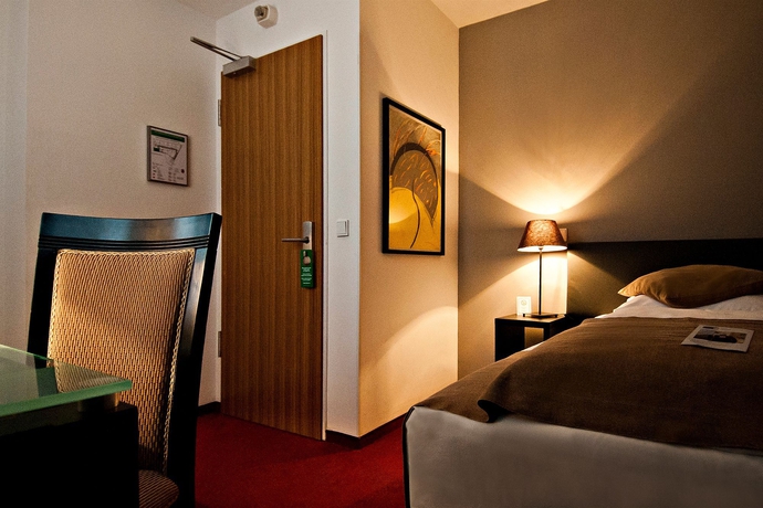 Imagen de la habitación del Hotel Homaris The Corner. Foto 11