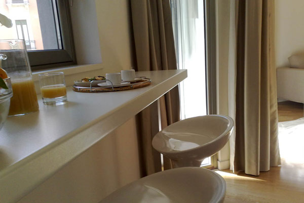 Imagen del bar/restaurante del Hotel Home 15 Residence. Foto 4