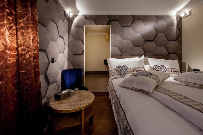 Imagen de la habitación del Hotel Home Arosa. Foto 7