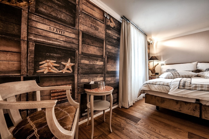 Imagen de la habitación del Hotel Home Arosa. Foto 12