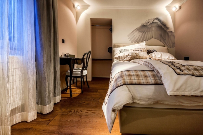 Imagen de la habitación del Hotel Home Arosa. Foto 15
