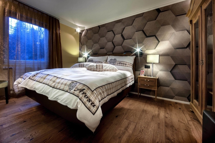 Imagen de la habitación del Hotel Home Arosa. Foto 16