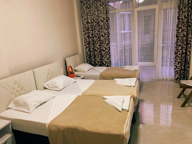 Imagen de la habitación del Hotel Home Away From Home. Foto 16