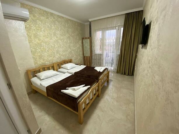 Imagen de la habitación del Hotel Home Away From Home. Foto 19