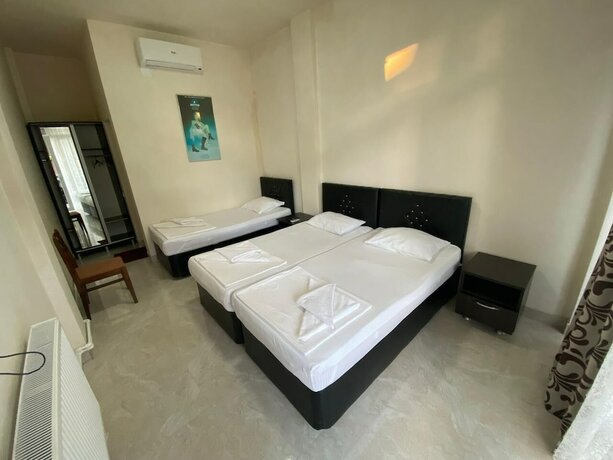 Imagen de la habitación del Hotel Home Away From Home. Foto 20