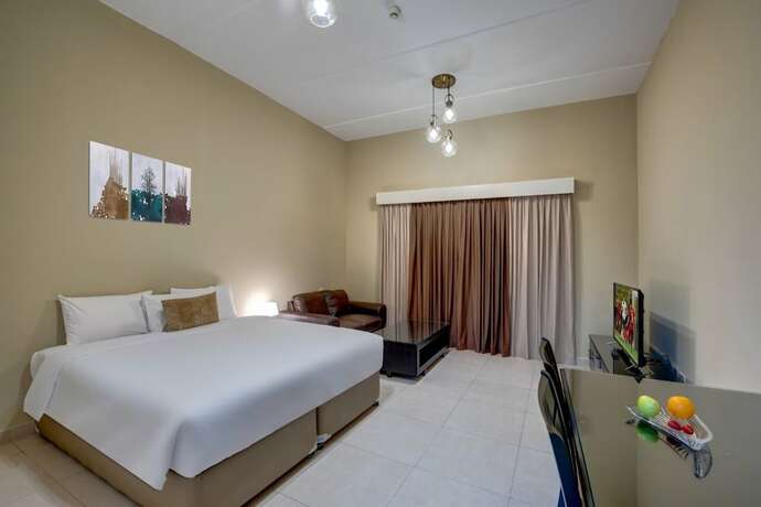 Imagen de la habitación del Hotel Home Away Holiday Homes. Foto 15
