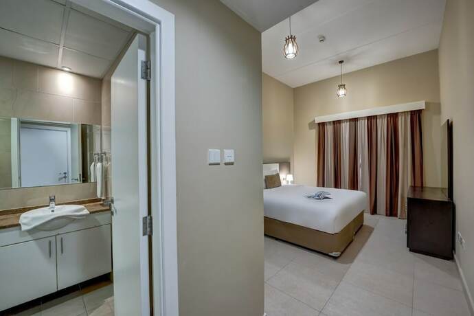 Imagen de la habitación del Hotel Home Away Holiday Homes. Foto 19