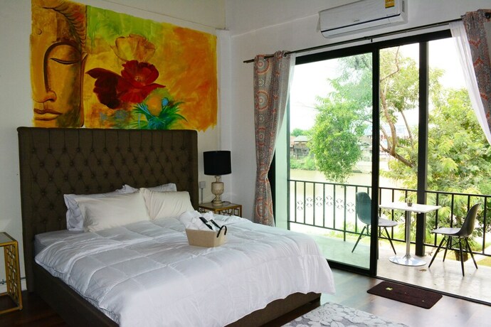 Imagen de la habitación del Hotel Home Ayutthaya. Foto 14