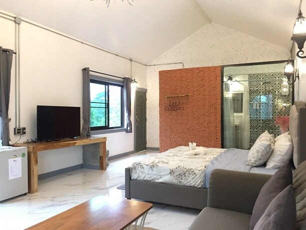 Imagen de la habitación del Hotel Home Ayutthaya. Foto 19