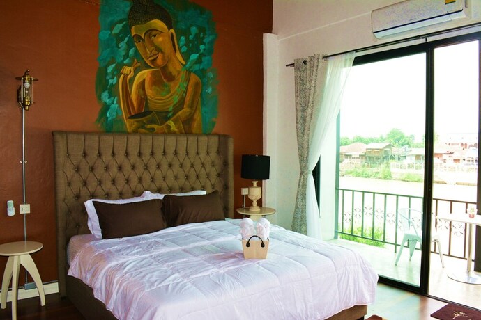 Imagen de la habitación del Hotel Home Ayutthaya. Foto 22