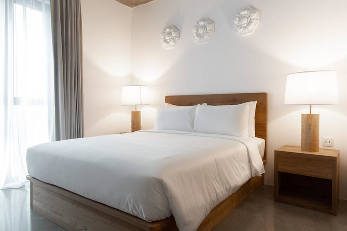 Imagen de la habitación del Hotel Home Chiang Mai. Foto 3