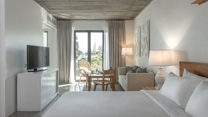 Imagen de la habitación del Hotel Home Chiang Mai. Foto 7