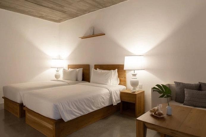 Imagen de la habitación del Hotel Home Chiang Mai. Foto 10