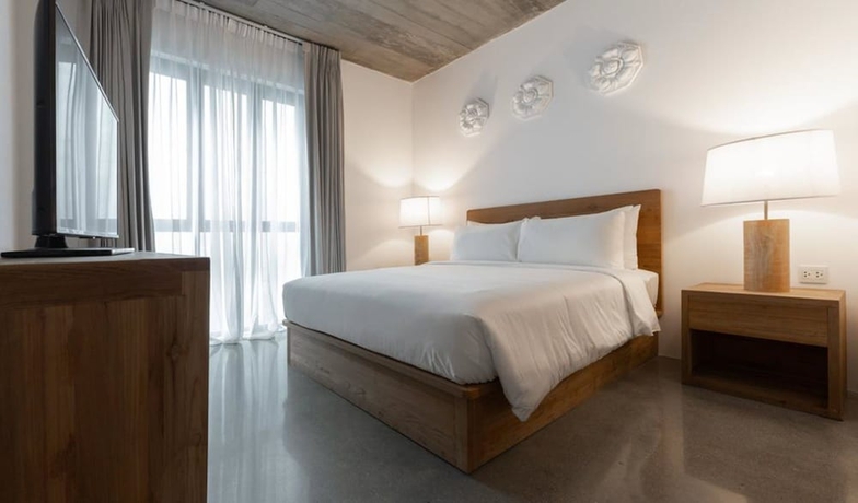 Imagen de la habitación del Hotel Home Chiang Mai. Foto 13