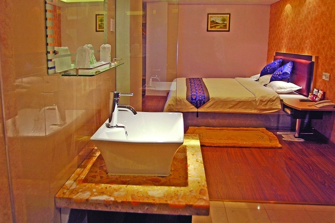 Imagen de la habitación del Hotel Home Club Shimao Branch. Foto 3