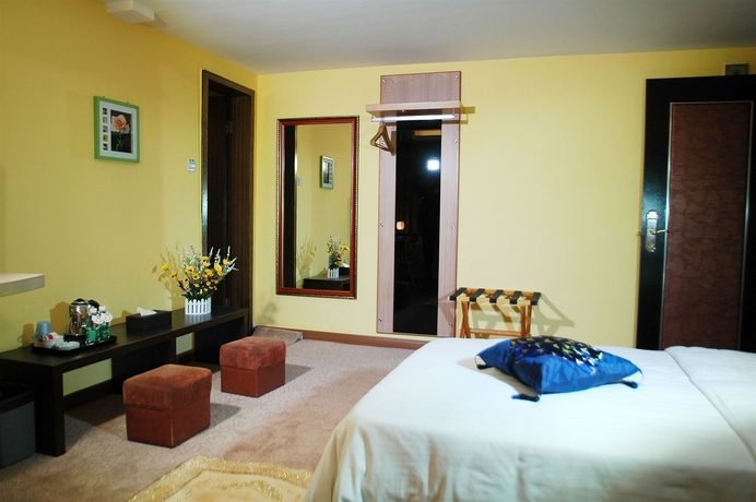 Imagen de la habitación del Hotel Home Club Shimao Branch. Foto 5