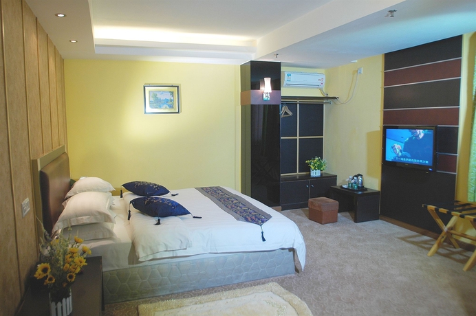 Imagen de la habitación del Hotel Home Club Shimao Branch. Foto 9