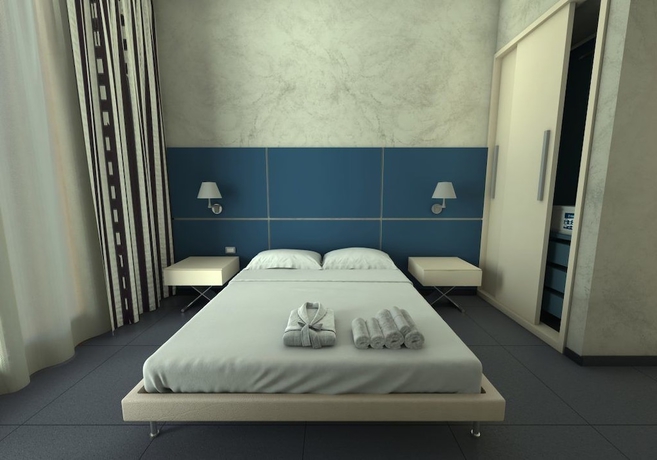 Imagen de la habitación del Hotel Home Club Suite. Foto 2