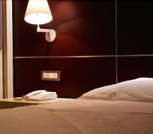 Imagen de la habitación del Hotel Home Club Suite. Foto 4