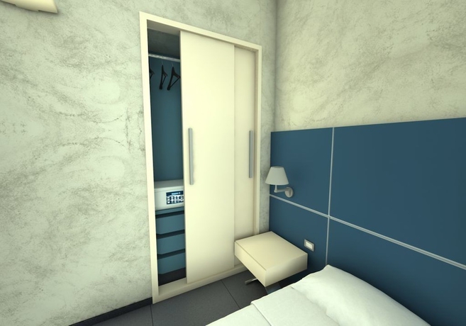 Imagen de la habitación del Hotel Home Club Suite. Foto 5